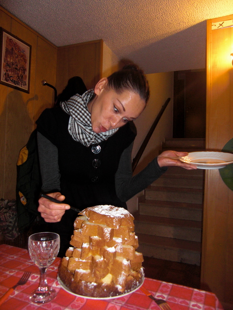 Olga decorating a cake