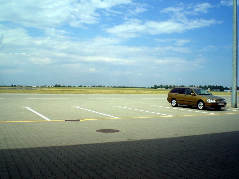This is the airport. 5 flights every day, and a parked car.